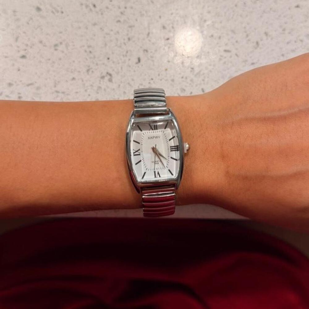 Silver vintage minimalist watch with roman numerals